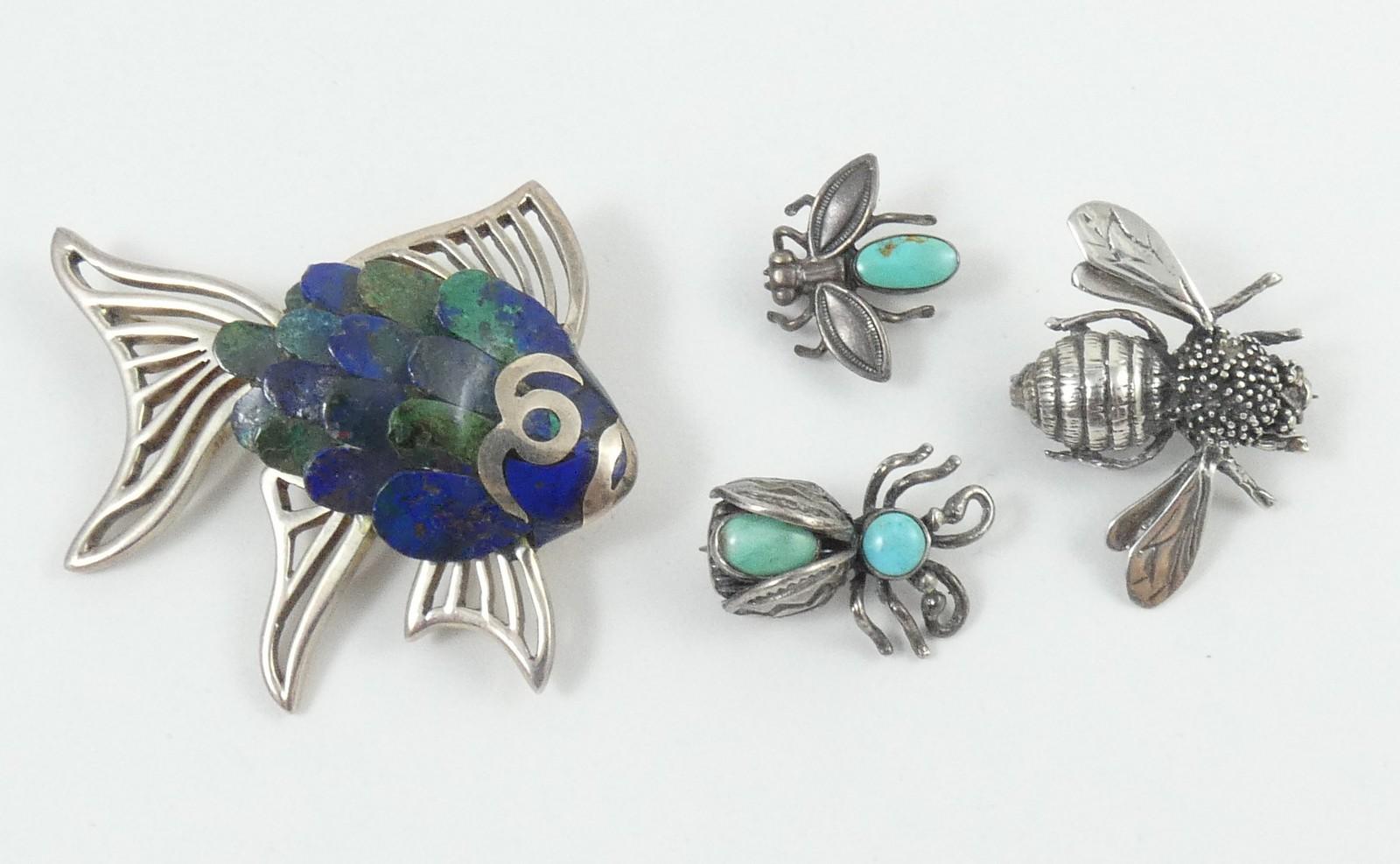 4 STERLING BROOCHES