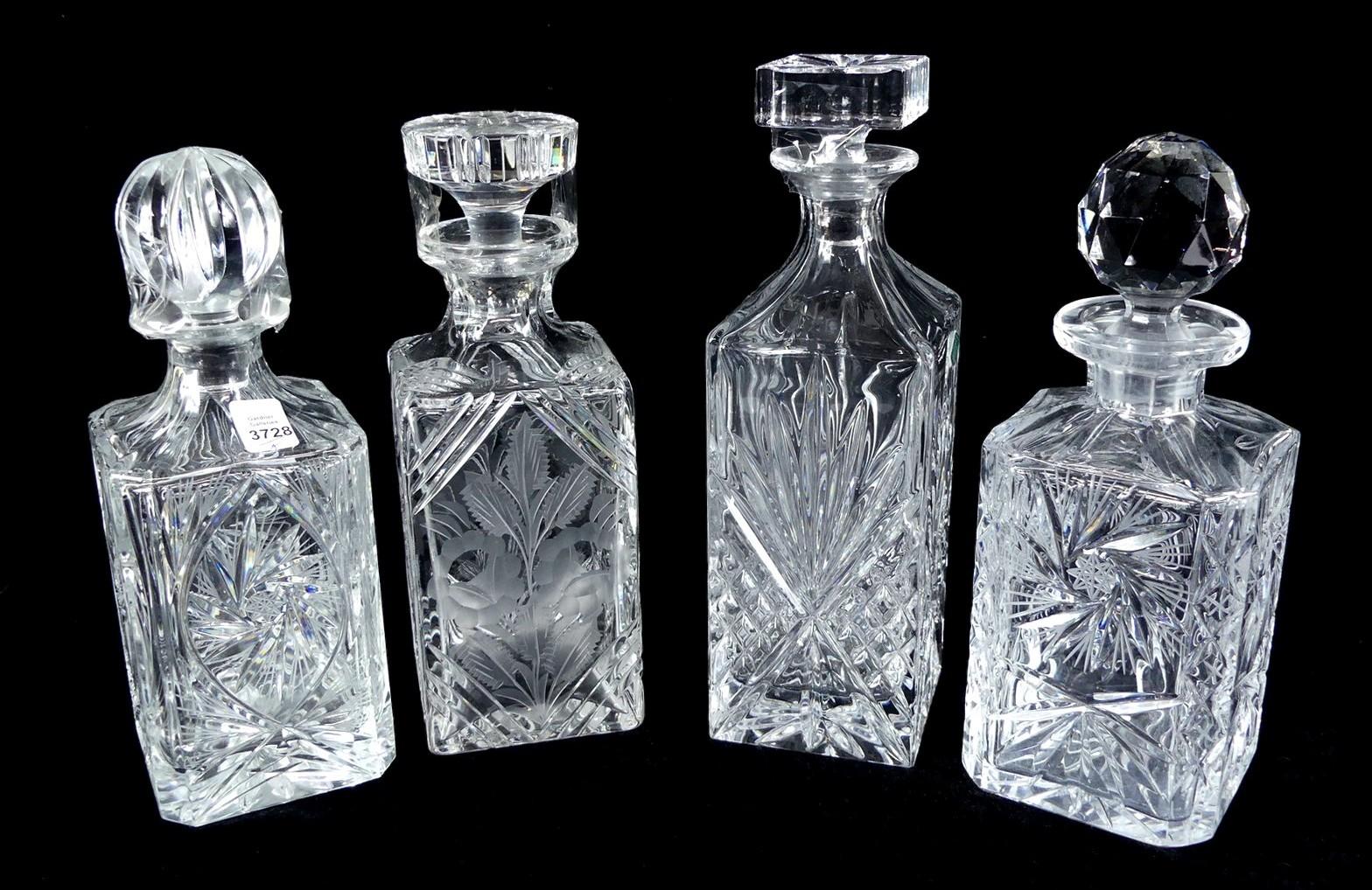 FOUR CRYSTAL DECANTERS