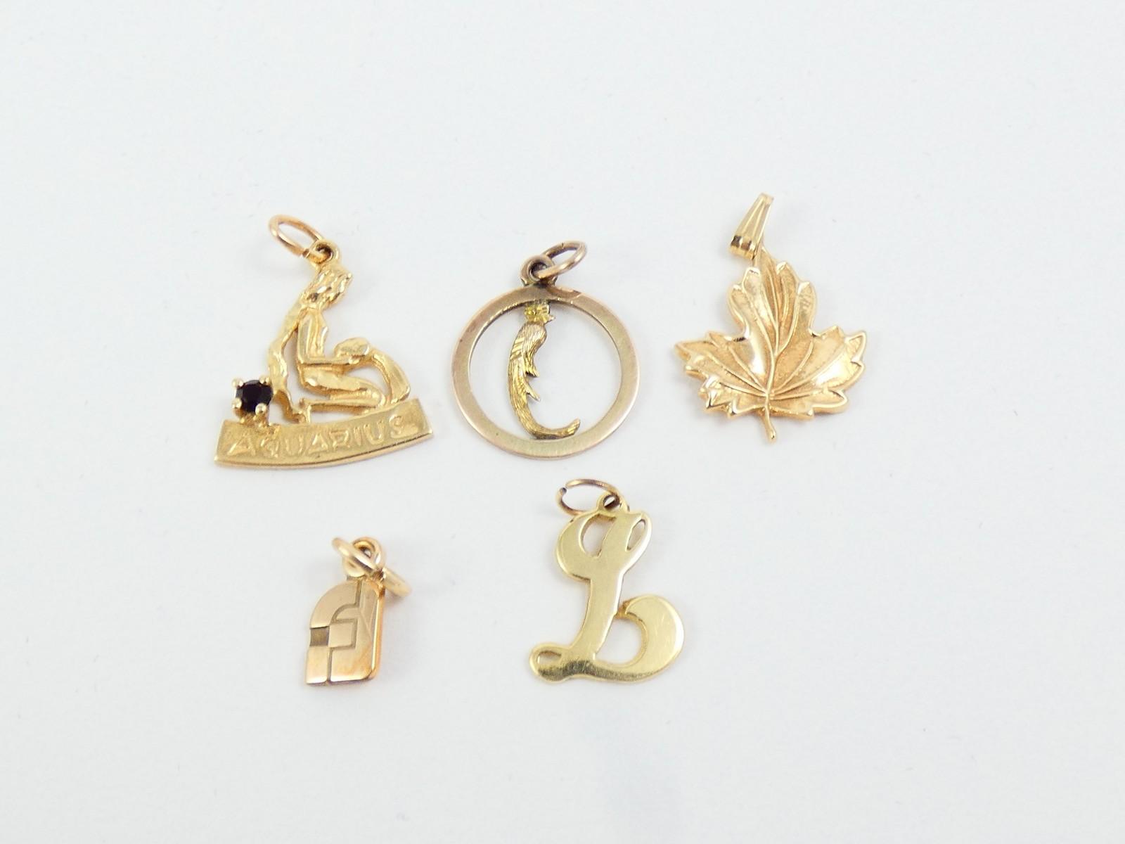 5 GOLD CHARMS