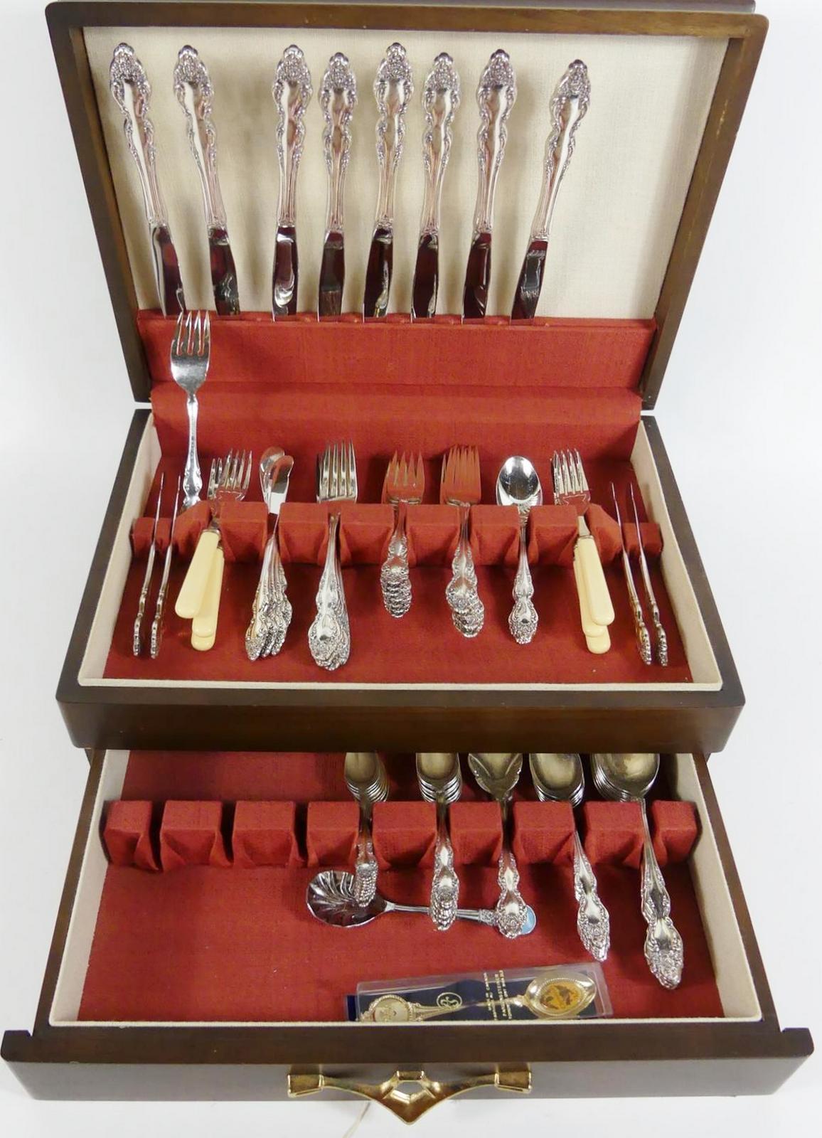 TWO SETS OF CUTLERY