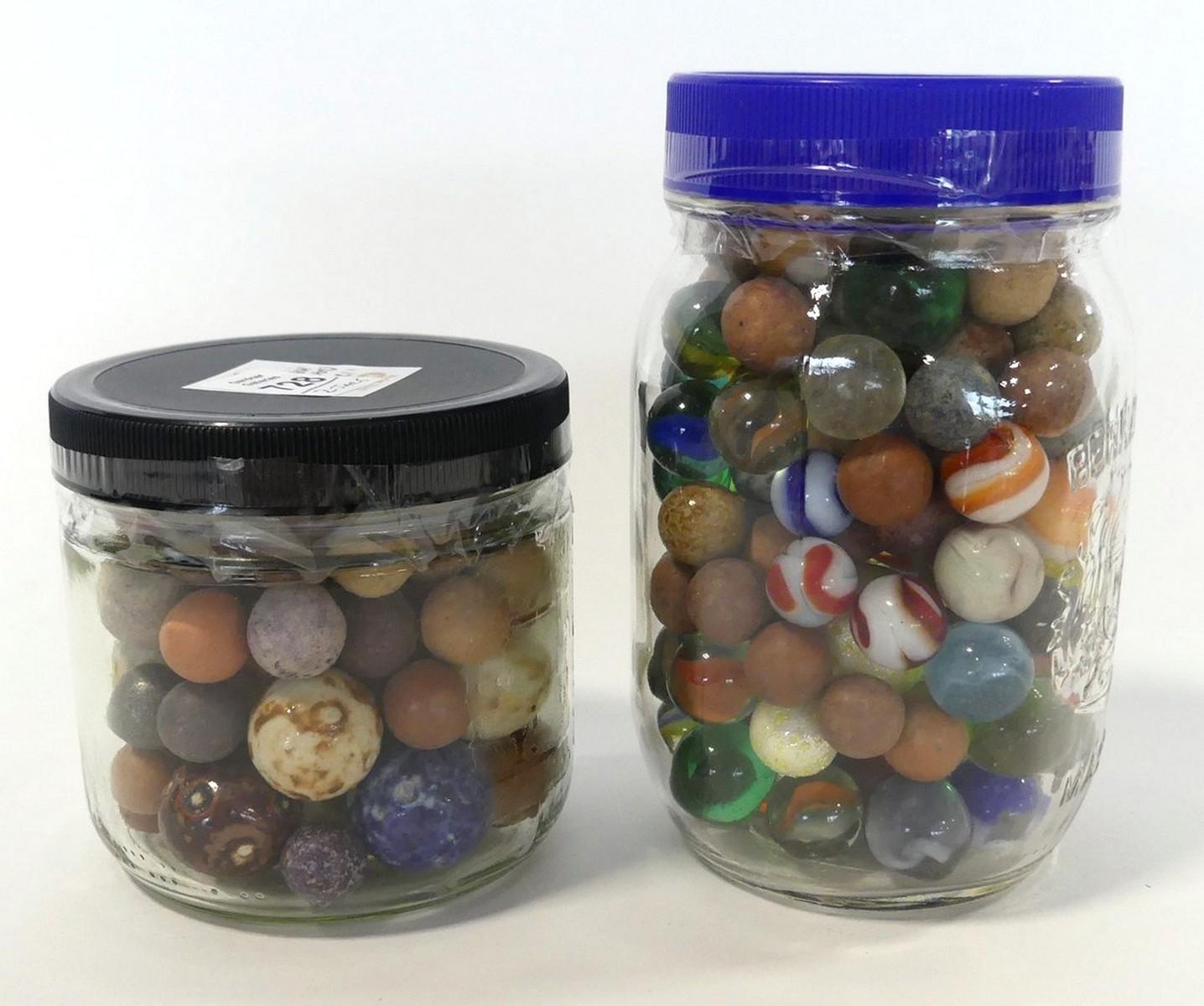 TWO JARS OF MARBLES