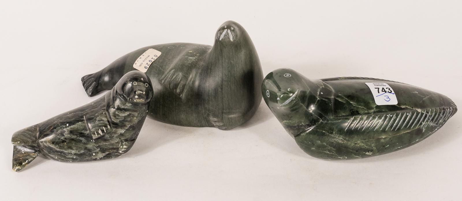 THREE INUIT SOAPSTONE "SEAL" CARVINGS