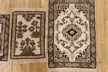 FOUR SMALL RUGS