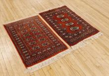 TWO SMALL BOKHARA RUGS