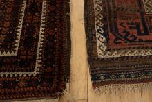 TWO ANTIQUE PERSIAN RUGS