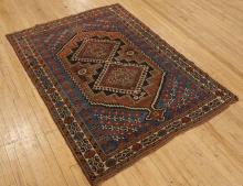 ANTIQUE PERSIAN RUG