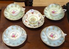 FIVE PARAGON CUPS AND SAUCERS