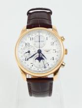 IMPORTANT GOLD LONGINES COMPLICATED WATCH