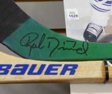 TWO AUTOGRAPHED HOCKEY STICKS AND DISPLAY