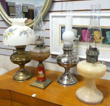 FOUR OIL LAMPS