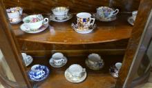 TWELVE CUPS AND SAUCERS