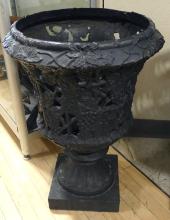 PAIR OF CAST IRON GARDEN URNS