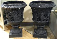 PAIR OF CAST IRON GARDEN URNS