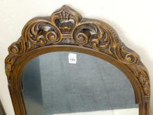 TWO KRUG WALL MIRRORS