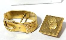 TWO GOLD PINS