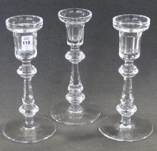 THREE WATERFORD CRYSTAL CANDLESTICKS