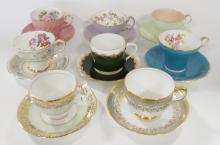 EIGHT CUPS AND SAUCERS