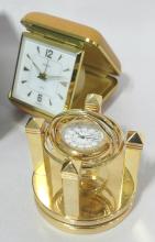 SIX CLOCKS AND MEASURING TAPE