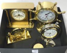 SIX CLOCKS AND MEASURING TAPE