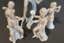 FIVE GERMAN PORCELAIN FIGURINES