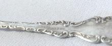 TWO SETS OF STERLING SOUP SPOONS