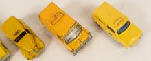 FOUR DINKY TOYS TAXI CABS