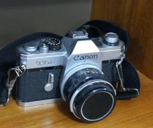 THREE CAMERAS AND FOUR LENSES