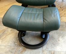 STRESSLESS DARK GREEN LEATHER RECLINER AND FOOTSTOOL