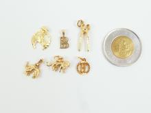 6 GOLD CHARMS