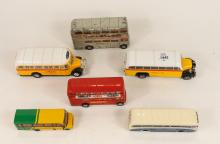 SIX TOY BUSES