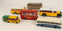 SIX TOY BUSES