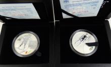 2 SILVER OLYMPIC COINS