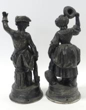 PAIR OF CAST METAL SCULPTURES