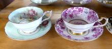 FOUR ENGLISH CUPS AND SAUCERS