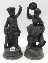 PAIR OF CAST METAL SCULPTURES