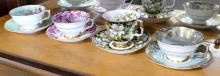 FOUR ENGLISH CUPS AND SAUCERS