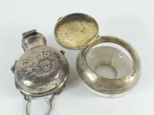 2 ANTIQUE SILVER HOLDERS