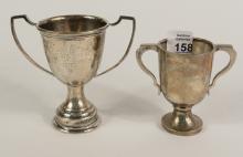 TWO STERLING TROPHIES