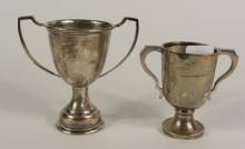 TWO STERLING TROPHIES