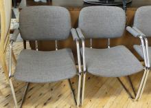 FOUR MCM CHROME ARMCHAIRS