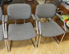 FOUR MCM CHROME ARMCHAIRS