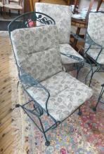 FOUR WROUGHT IRON PATIO CHAIRS