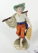 ANTIQUE PORCELAIN CABINET FIGURINE