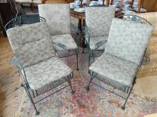 FOUR WROUGHT IRON PATIO CHAIRS