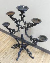 ANTIQUE CAST IRON CANDLE STAND