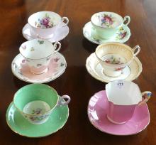 SIX CUPS AND SAUCERS