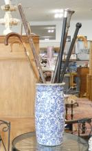 SEVEN WALKING STICKS WITH STAND