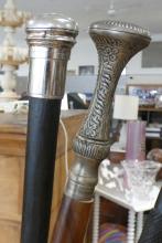 SEVEN WALKING STICKS WITH STAND