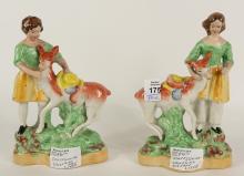 PAIR OF ANTIQUE STAFFORDSHIRE FIGURINES