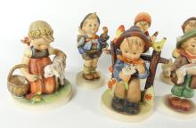 7 HUMMEL FIGURINES